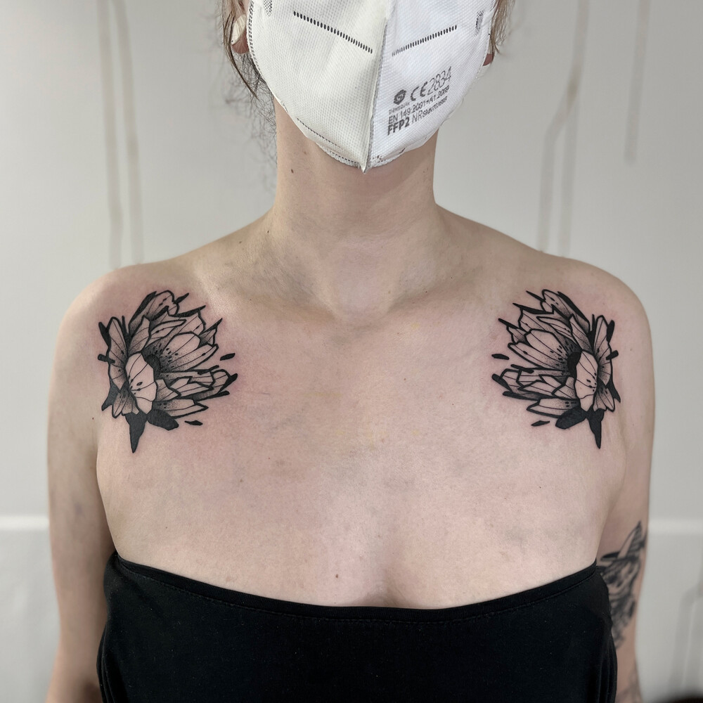 Abstract Flower chest Tattoo in Blackwork style by Christian Eisenhofer